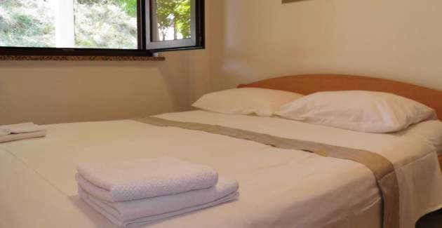 Apartment Starcevic-Filipovic with a Backyard and BBQ, 150 m from the Beach